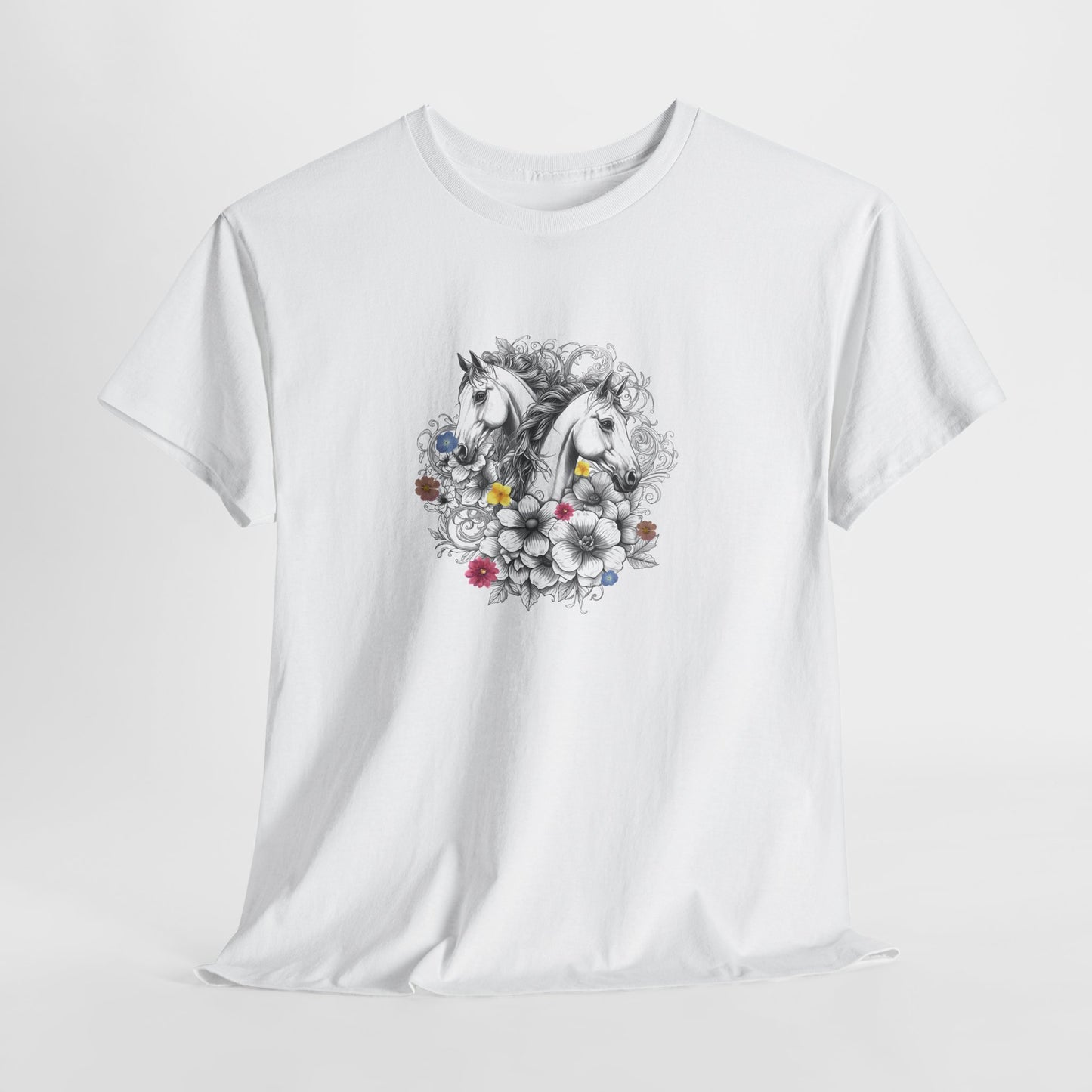 White t-shirt with a decorative unicorn and floral design on a light gray background