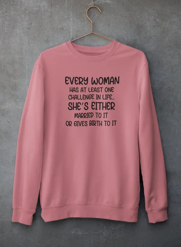 Pink sweatshirt with text on a gray background