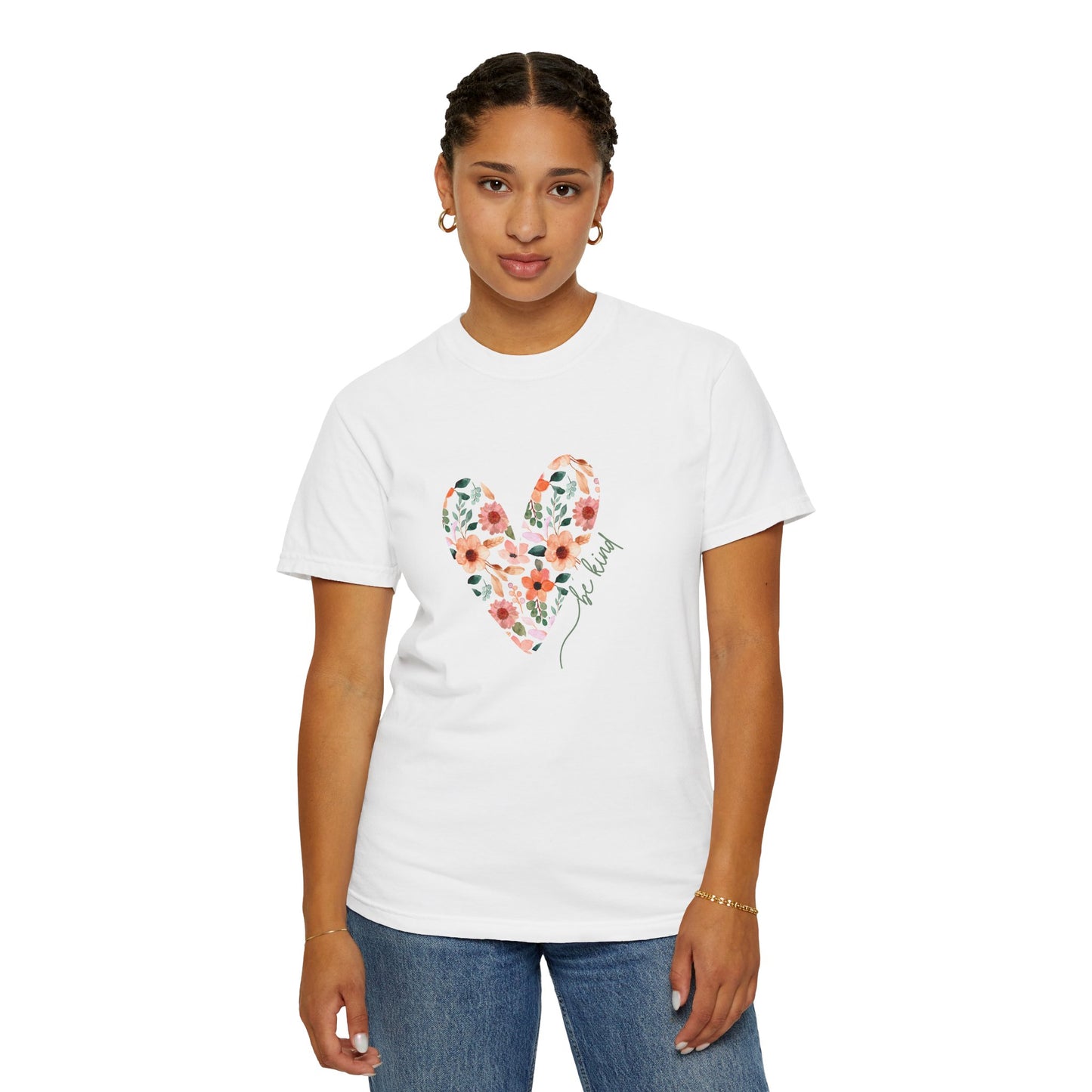 A girl wearing a white floral heart be ind graphic tee shirt.