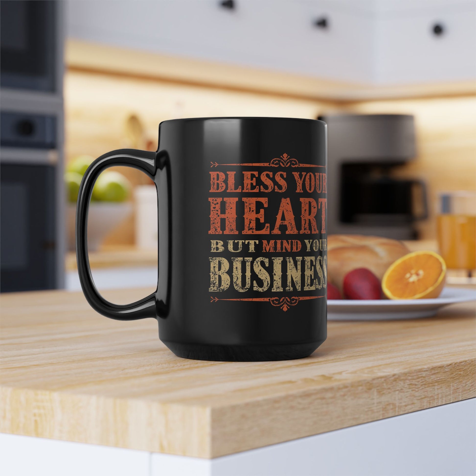Black mug with text on a kitchen counter