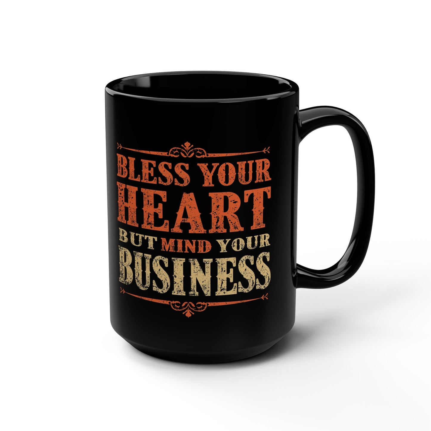 Black mug with text 'Bless your heart but mind your business' on a white background