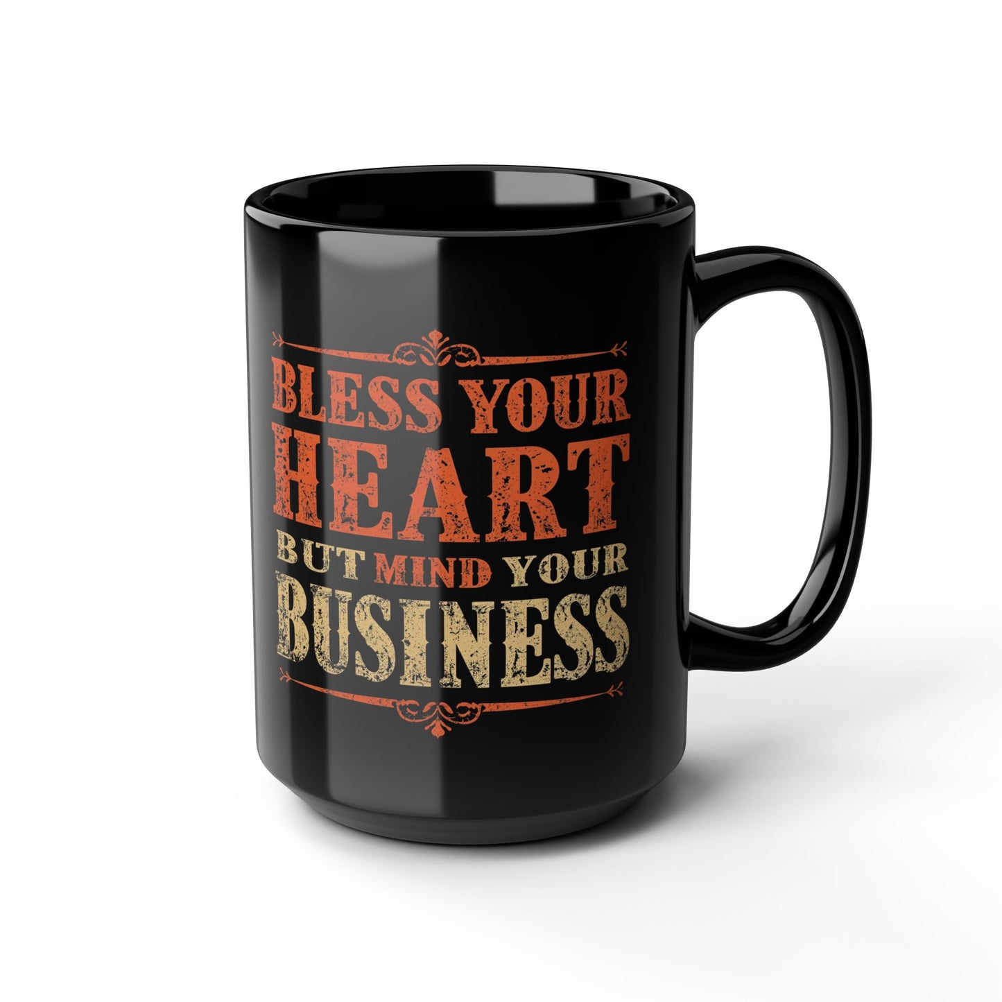 Black mug with text 'Bless your heart but mind your business' on a white background