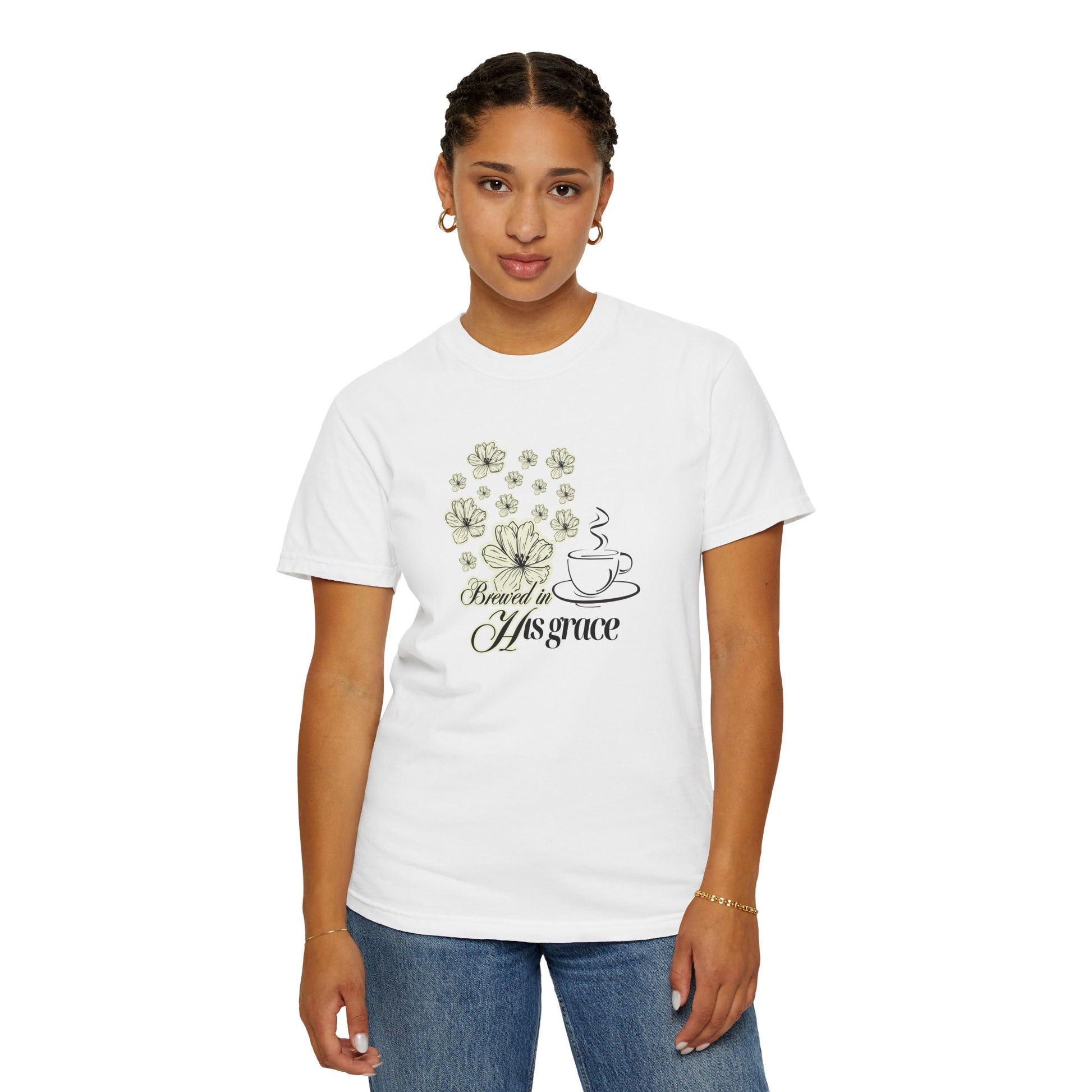 Girl wearing white tee shirt with flowers and coffee cup graphics.