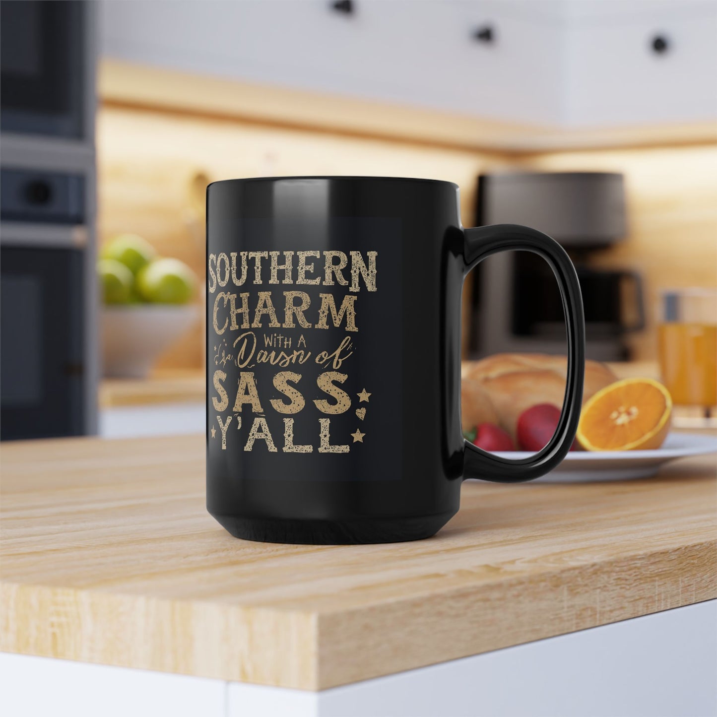 Black mug with gold text on a kitchen counter