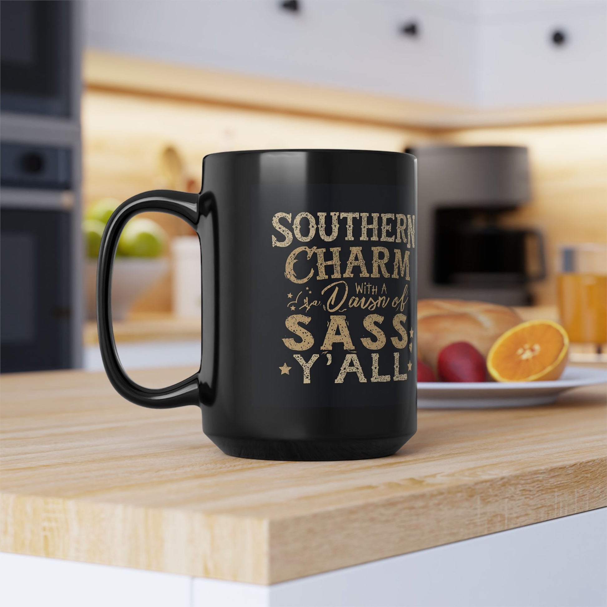 Black mug with gold text on a kitchen counter