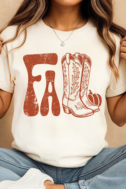 Women wearing a white cuffed T-shirt with FALL and boots as the L's in a peach background sitting cross legged on the floor.