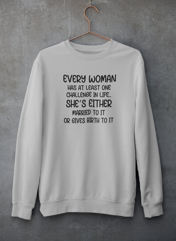 White sweatshirt with humorous text on a gray background