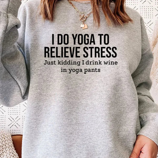 Gray sweatshirt with humorous text design worn by a person.