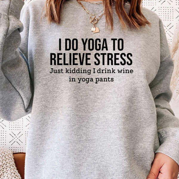 Person wearing a gray sweatshirt with humorous text design.