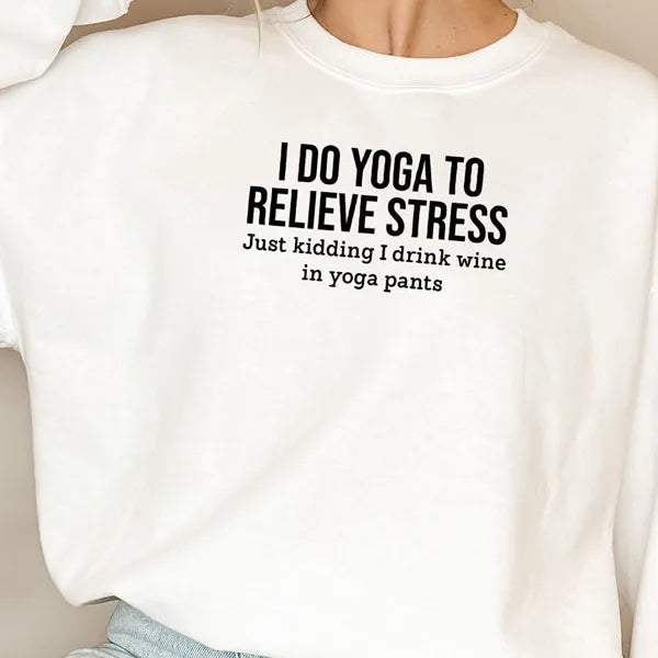 White sweatshirt with humorous text on a plain background